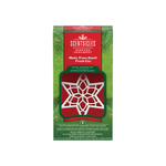 Front view of the Scentsicles 'White Winter Fir' scented ornament packaging. The box features a festive design with green pine graphics and a bold red center displaying the product name. The package includes a white snowflake-shaped scented star ornament designed to make trees smell freshly cut, with text in both English and French.